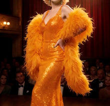 Load image into Gallery viewer, Fluffy orange ostrich feather boa for DIY craft projects and apparel embellishments.