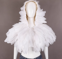 Load image into Gallery viewer, Mannequin wearing a white hooded garment with feather-like details on a gray background