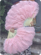 Load image into Gallery viewer, A pair of large baby pink Ostrich Feather Fans for burlesque dancing and stage performance.
