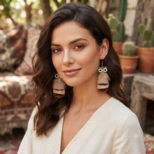 Load image into Gallery viewer, Model wearing bohemian feather dangle earrings with natural speckled plumes