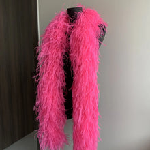 Load image into Gallery viewer, Luxurious bright pink ostrich feather boa, perfect for showgirl costumes and stage performances.