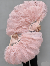 Load image into Gallery viewer, Champagne pink ostrich feather fan, elegant and warm-toned fluffy fan for weddings, events and photoshoots