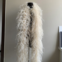 Load image into Gallery viewer, Natural looking cream beige ostrich feather boa, soft texture for clothing trim.