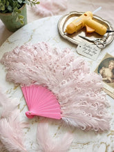Load image into Gallery viewer, A fluffy dusky pink curly feather fan laid flat showing thick layers
