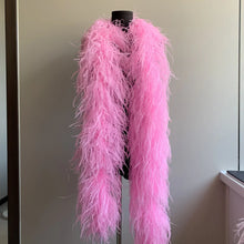 Load image into Gallery viewer, Bold fuchsia pink ostrich feather boa, eye-catching accessory for party wear and theater costumes.