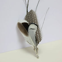 Load image into Gallery viewer, Grey and white feather boutonniere for groom, elegant feather lapel pin for wedding, prom, and formal events.