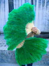 Load image into Gallery viewer, Large bright green ostrich feather fan, vibrant fluffy fan for stage performances, burlesque shows and festivals