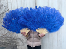 Load image into Gallery viewer, large royal blue ostrich feather fan, showcasing its full spread and fluffiness