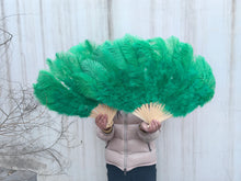 Load image into Gallery viewer, medium green ostrich feather fan, showing feather texture and fan spread