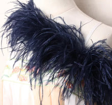 Load image into Gallery viewer, Navy blue feathered shoulder piece on a mannequin against a floral background