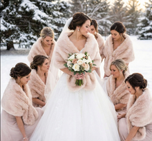 Load image into Gallery viewer, Nude blush faux fur wrap worn by bridesmaids at a wedding, soft and romantic stole for winter weddings