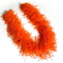 Load image into Gallery viewer, Vibrant orange ostrich feather boa, high-quality stage prop for burlesque and theater.