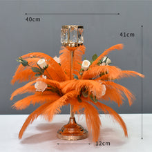 Load image into Gallery viewer, Tall wedding centerpiece featuring white ostrich feathers in a gold Eiffel Tower vase for a luxury reception.