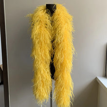 Load image into Gallery viewer, Bright yellow ostrich feather boa, vibrant dance wear accessory for stage and carnival performances.