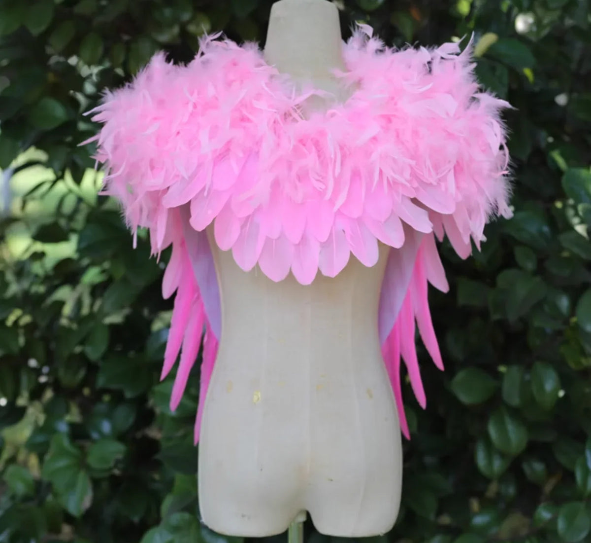 Soft pink feather fairy wings costume accessory, fluffy feather wings for Halloween, cosplay, birthday parties, and photo props.
