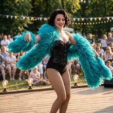 Load image into Gallery viewer, Model wearing a fluffy real teal ostrich feather boa for festival rave outfit