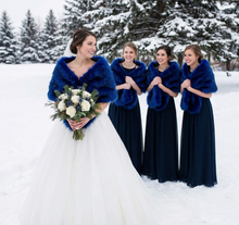 Load image into Gallery viewer, Royal blue faux fur wrap worn by bridesmaids at a wedding, rich and elegant stole for formal events