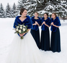 Load image into Gallery viewer, Royal blue faux fur wrap worn by bridesmaids at a wedding, rich and elegant stole for formal events