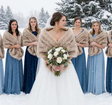 Load image into Gallery viewer, Sandy beige faux fur wrap worn by bridesmaids at a wedding, neutral and versatile stole for winter events