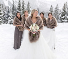 Load image into Gallery viewer, Silver faux fur wrap with gold tips worn by bridesmaids at a wedding, elegant and luxurious stole for winter events