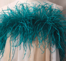 Load image into Gallery viewer, thick, fluffy emerald green ostrich feather boa showing the dense, high-quality plumes.