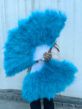 Load image into Gallery viewer, Turquoise blue marabou feather fan in use, vibrant fan for stage performances, festivals and parties