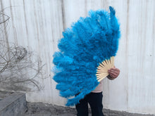 Load image into Gallery viewer, Turquoise blue ostrich feather fan, vibrant and eye-catching fan for photoshoots, events and themed parties