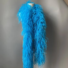 Load image into Gallery viewer, Vibrant turquoise ostrich feather boa, high-quality feather scarf for dance performance and costumes.