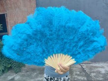 Load image into Gallery viewer, Turquoise blue ostrich feather fan, vibrant and fluffy handheld fan for performances, events and photoshoots