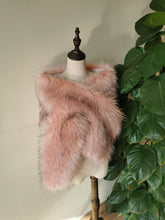 Load image into Gallery viewer, A pink faux fur bridal wrap displayed on a mannequin.