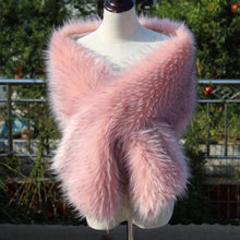 Load image into Gallery viewer, A pink faux fur bridal wrap displayed on a mannequin, with a background of greenery and a pink sky.
