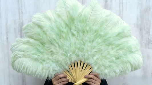 Mint Green Dreams: The Feather Fan That Steals the Show