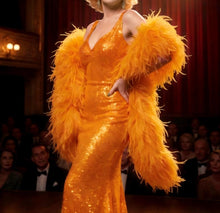 Load image into Gallery viewer, Fluffy orange ostrich feather boa for DIY craft projects and apparel embellishments.
