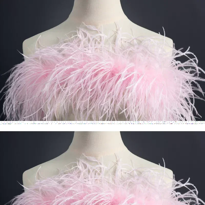 Luxurious soft pink ostrich feather boa, 6-ply thickness, perfect for evening wear and party costumes.