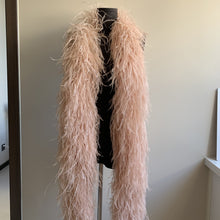 Load image into Gallery viewer, Sophisticated champagne gold ostrich feather boa, luxurious wrap for gala events.
