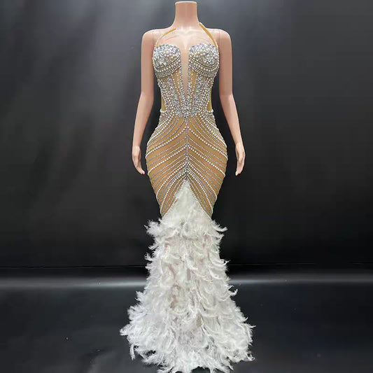 Elegant champagne gold and white crystal rhinestone gown with soft feather details