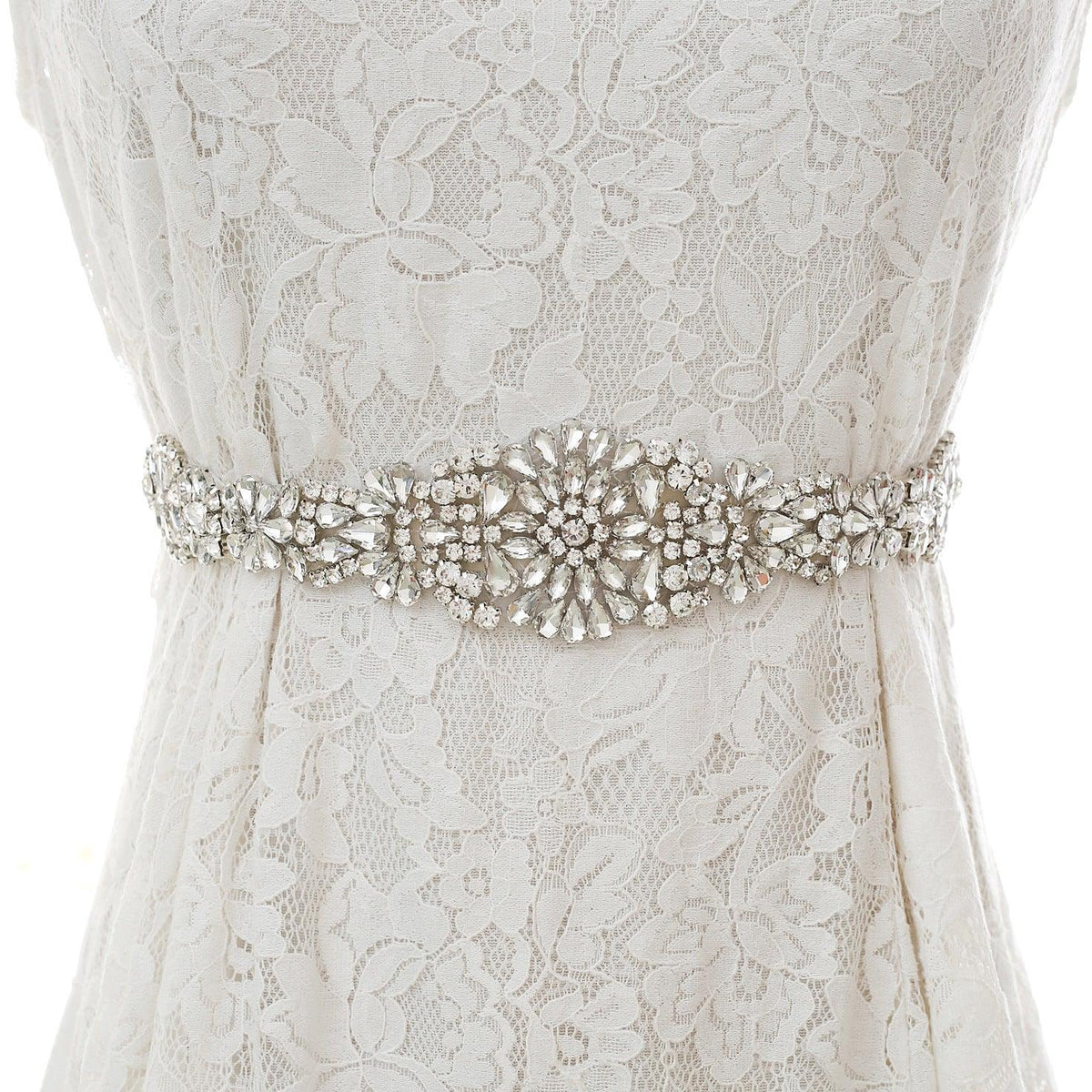 A delicate leaf and flower pattern rhinestone bridal sash, shimmering silver crystal trimming for DIY wedding décor.