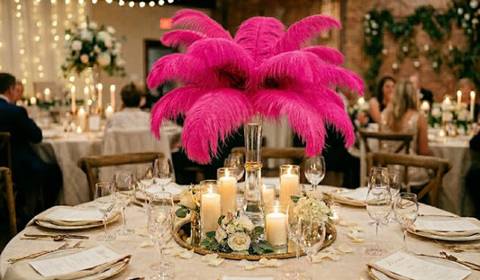 Bold hot pink ostrich feather centerpiece, eye-catching floral alternative for party table settings.