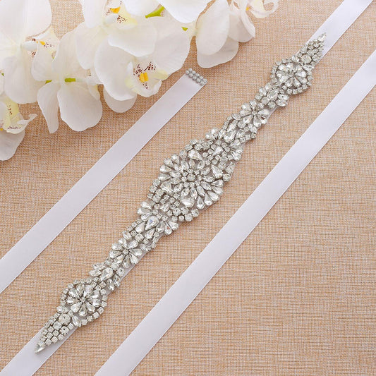 Exquisite floral pattern rhinestone bridal belt with shimmering crystals, perfect for a garden wedding dress.