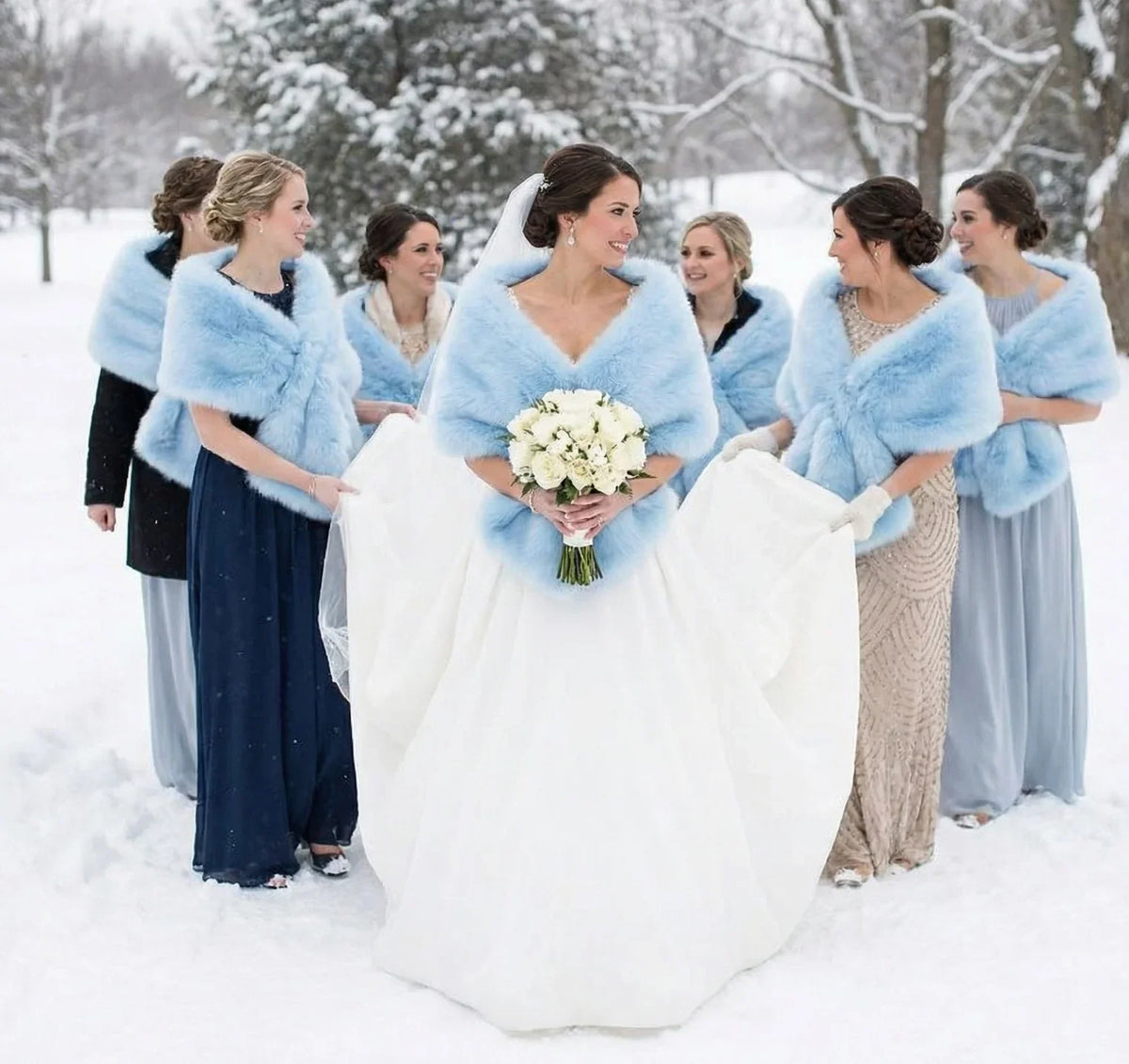 Light blue faux fur wrap worn by bridesmaids at a wedding, soft and elegant stole for spring events