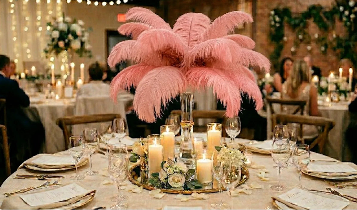 Soft light pink ostrich feather centerpiece displayed on a round dinner table for bridal celebrations.