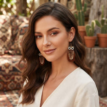 Load image into Gallery viewer, Handmade Long Vintage Feather Earrings — Boho Statement Dangles
