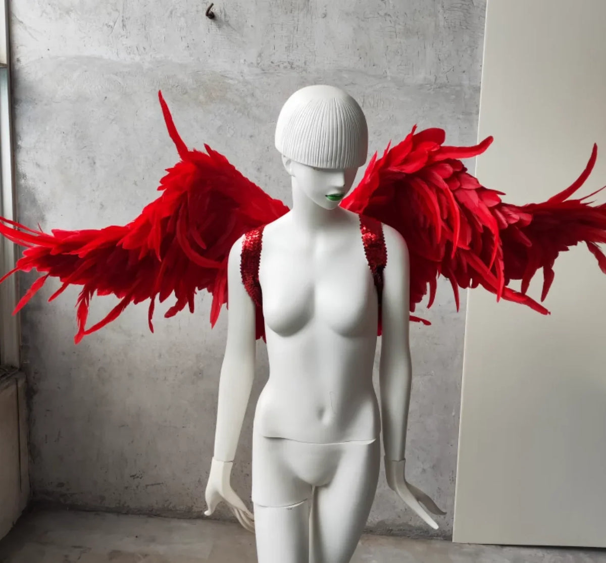 Red feather devil wings, bold costume accessory for Halloween parties, stage performances and themed events