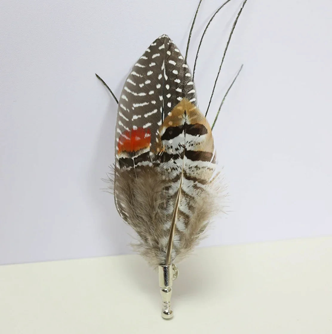 Striped feather boutonniere for groom, classic lapel pin for weddings and formal occasions