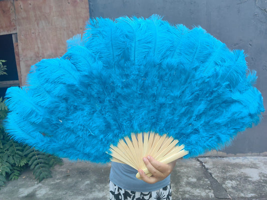 Turquoise blue ostrich feather fan, vibrant and fluffy handheld fan for performances, events and photoshoots